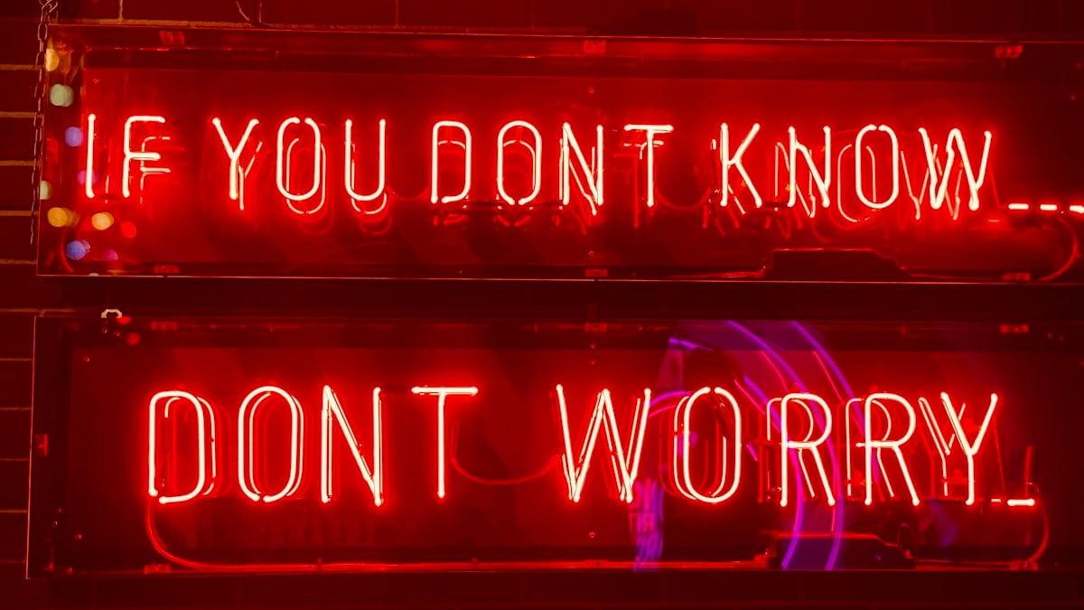 a neon sign that says if you don't know, don't worry